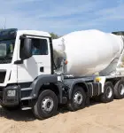 Concrete truck mixer on gravel yard