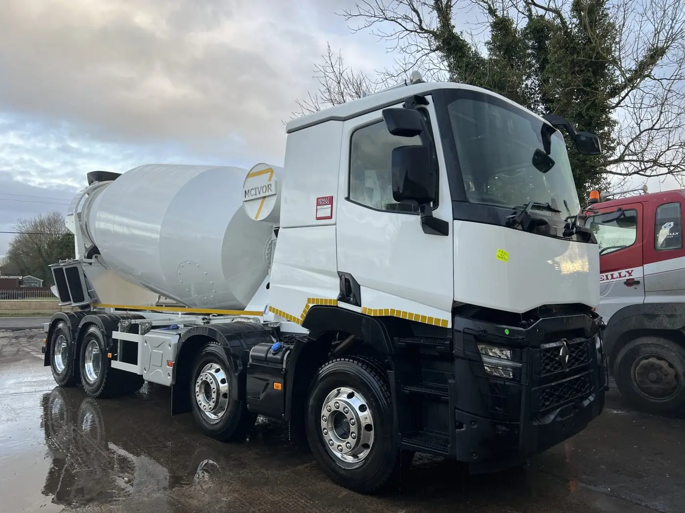 Newly refurbed concrete mixer attached to a truck