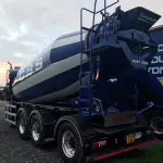 Rear view of concrete truck mixer at depot
