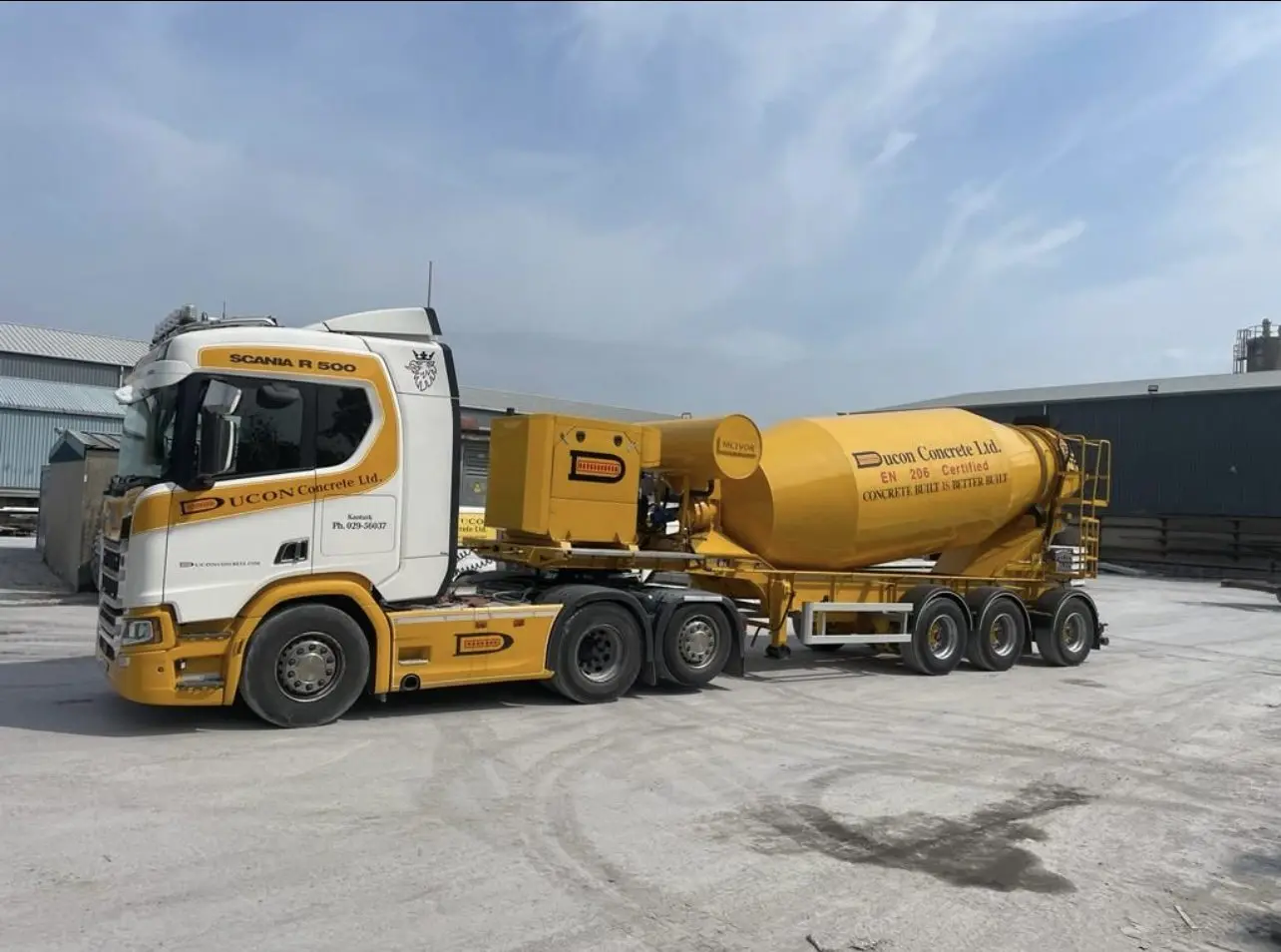 Concrete truck mixer on urban construction project