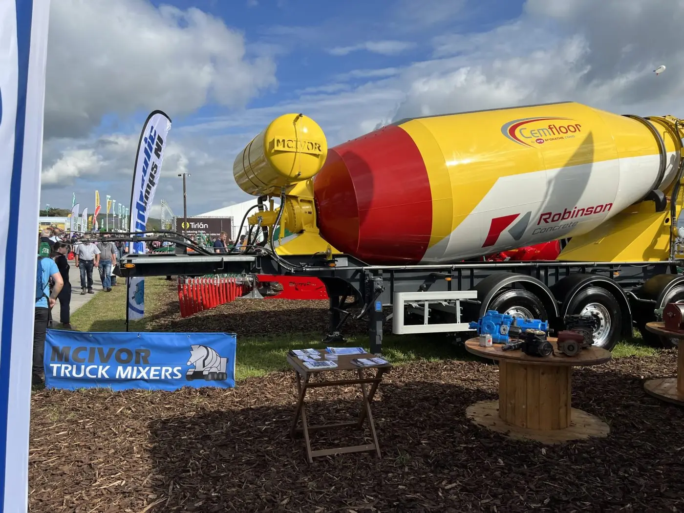 Mixer with branding on side at a fair